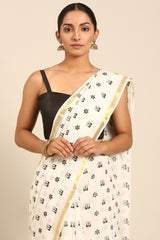 Bold Harmony Mul Cotton Saree in Black & White with Gold Zari Border