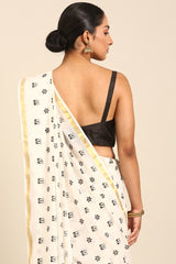 Bold Harmony Mul Cotton Saree in Black & White with Gold Zari Border